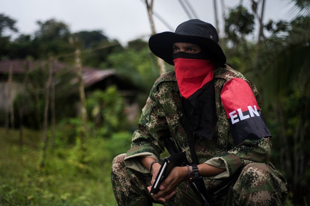 Uriel commander of the Western Front of War Omar Gomez of the National Liberation Army (ELN) guerrilla, during an interview with AFP in banks of the San Juan river, department of Choco, Colombia, on November 19, 2017. - Colombia's landmark peace deal with Marxist FARC rebels was supposed to mean peace for all but it has made little difference to indigenous and Afro-Colombian minorities, Amnesty International said on November 22, 2017. Although the agreement between the Colombian government and the FARC was signed, armed conflict is still very much the reality for millions across the country,